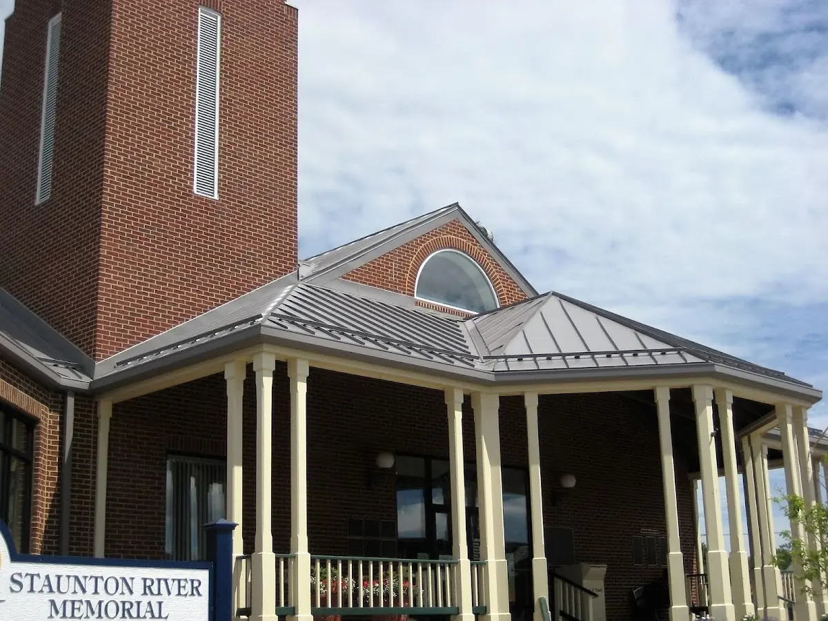 Skilled roofing craftsmen working on a residential roof in Carroll Square